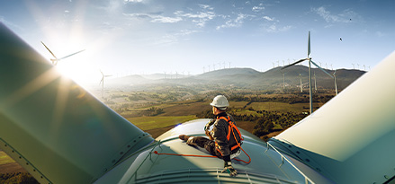 engineer sat on wind turbine 